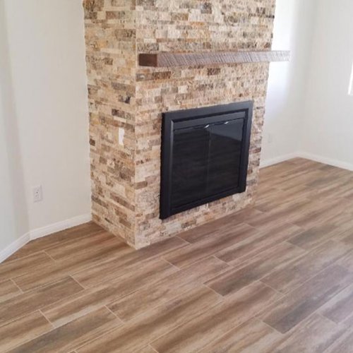 tile for fireplace and floors from Budget Flooring & Shutters in Las Vegas, NV