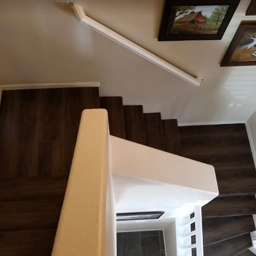 hardwood stairs provided and installed by Budget Flooring & Shutters in Las Vegas, NV